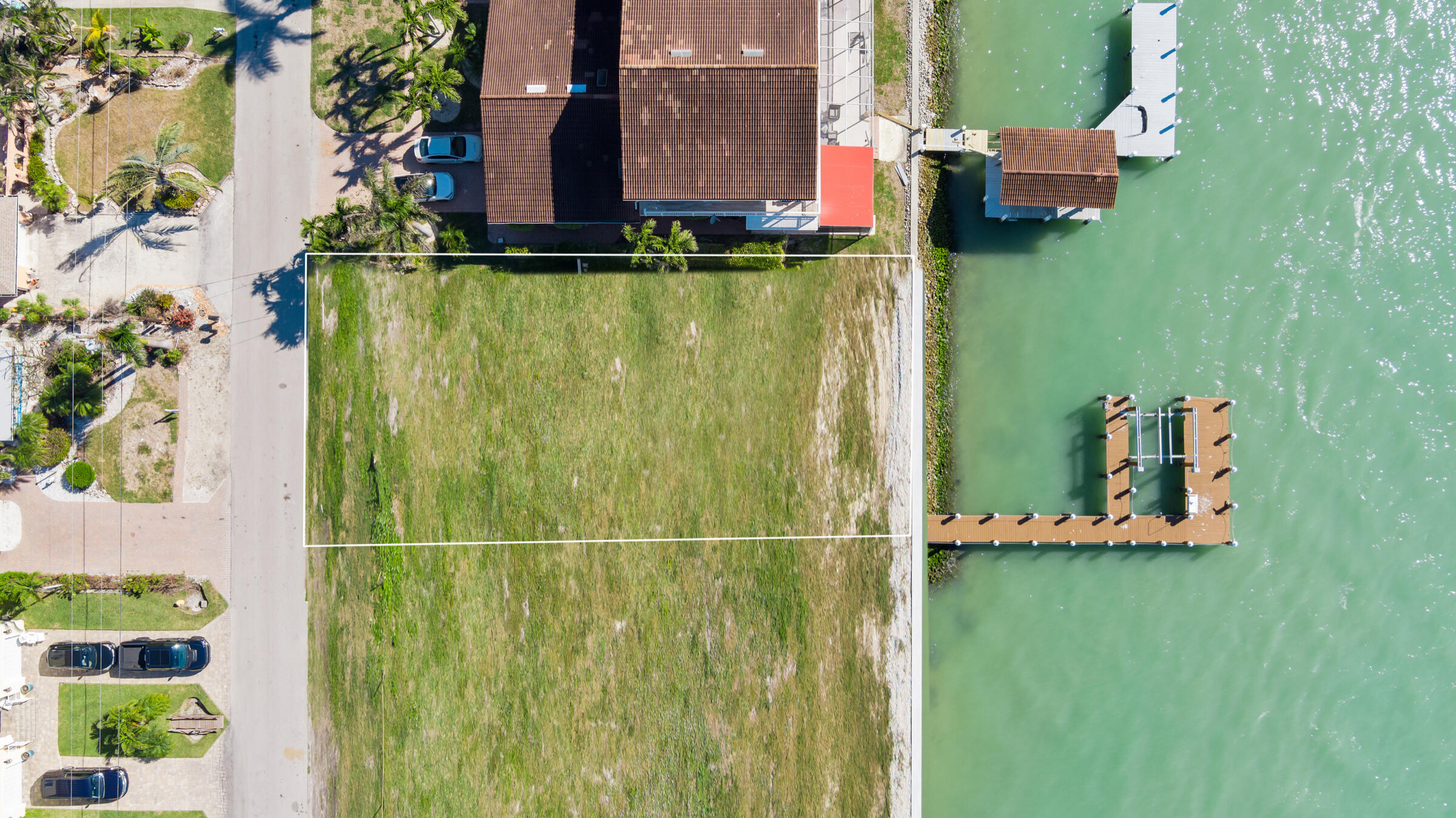 14 East Pelican Street Naples, FL 34113 - Photo 11 of 15 a view of a balcony with a lake view