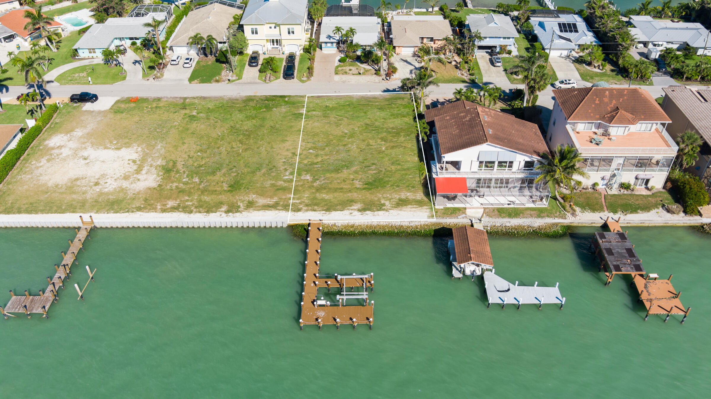 14 East Pelican Street Naples, FL 34113 - Photo 13 of 15 an aerial view of a house with a yard basket ball court and outdoor seating