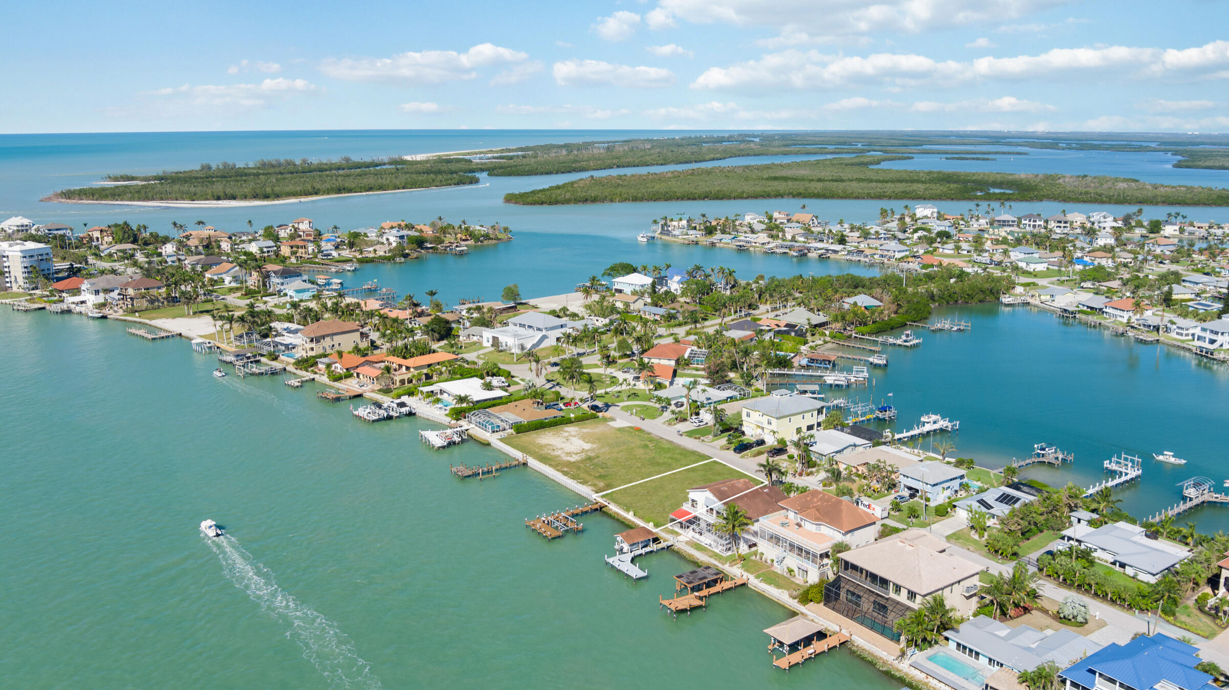 14 East Pelican Street Naples, FL 34113 - Photo 4 of 15 a view of a city with an ocean view