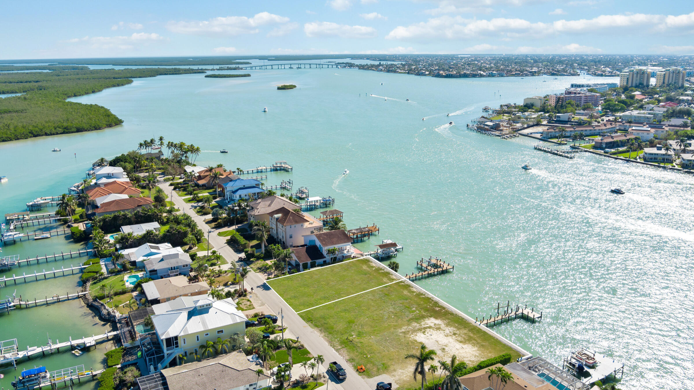 14 East Pelican Street Naples, FL 34113 - Photo 9 of 15 a view of a city and lake