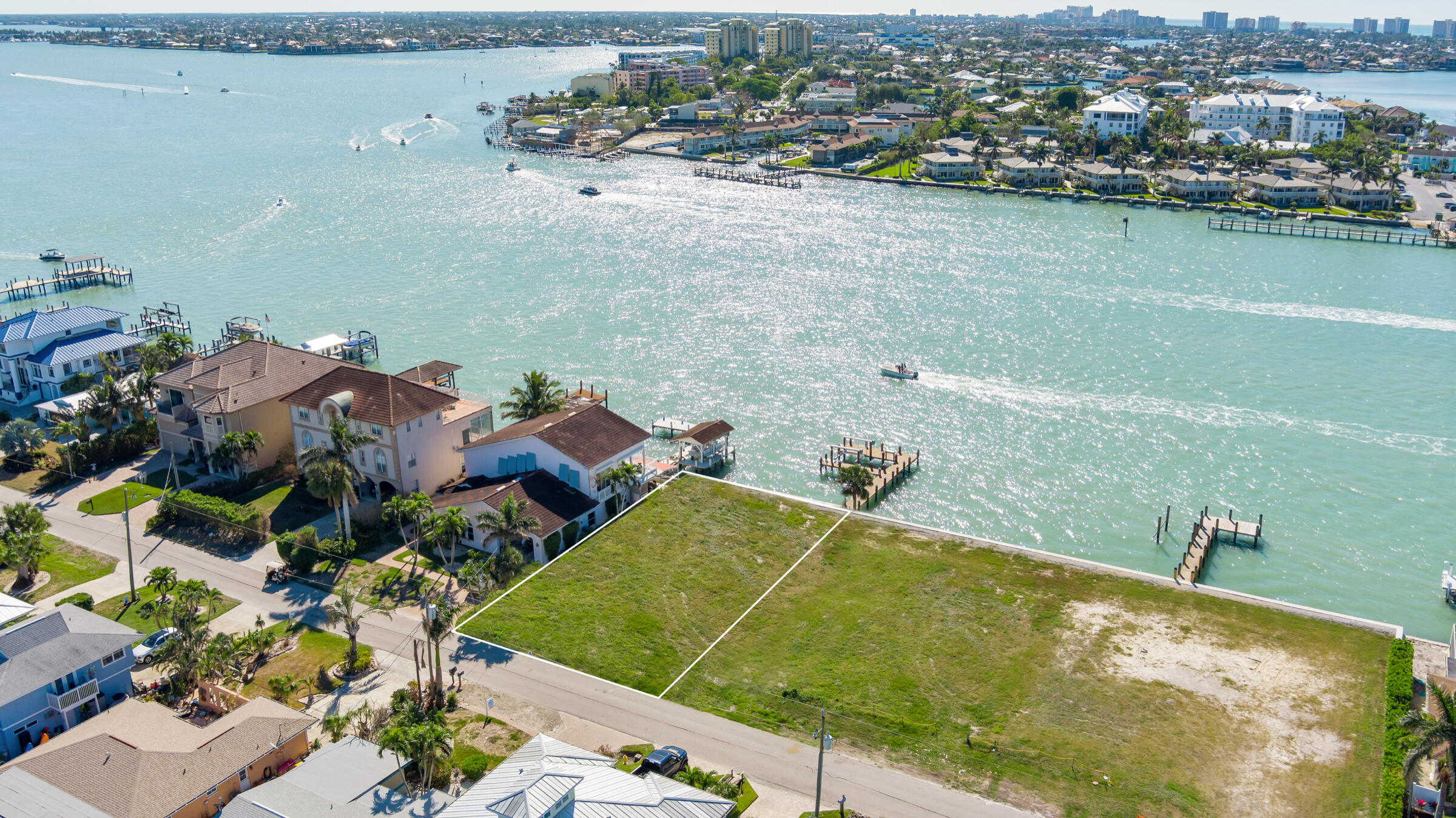 14 East Pelican Street Naples, FL 34113 - Photo 10 of 15 an aerial view of residential houses with outdoor space and river