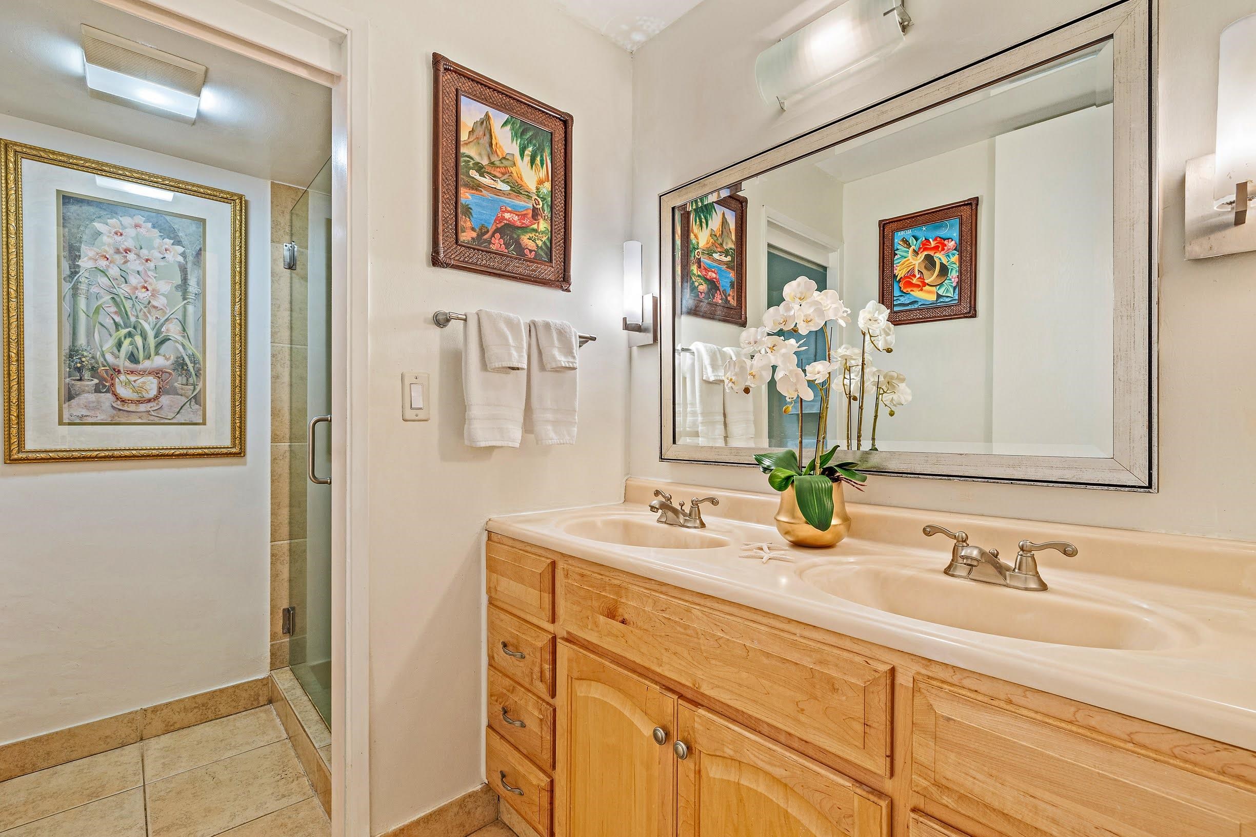 3543 Lower Honoapiilani Road, Unit H201 Lahaina, HI 96761 - Photo 15 of 31 a bathroom with double vanity sink and a mirror