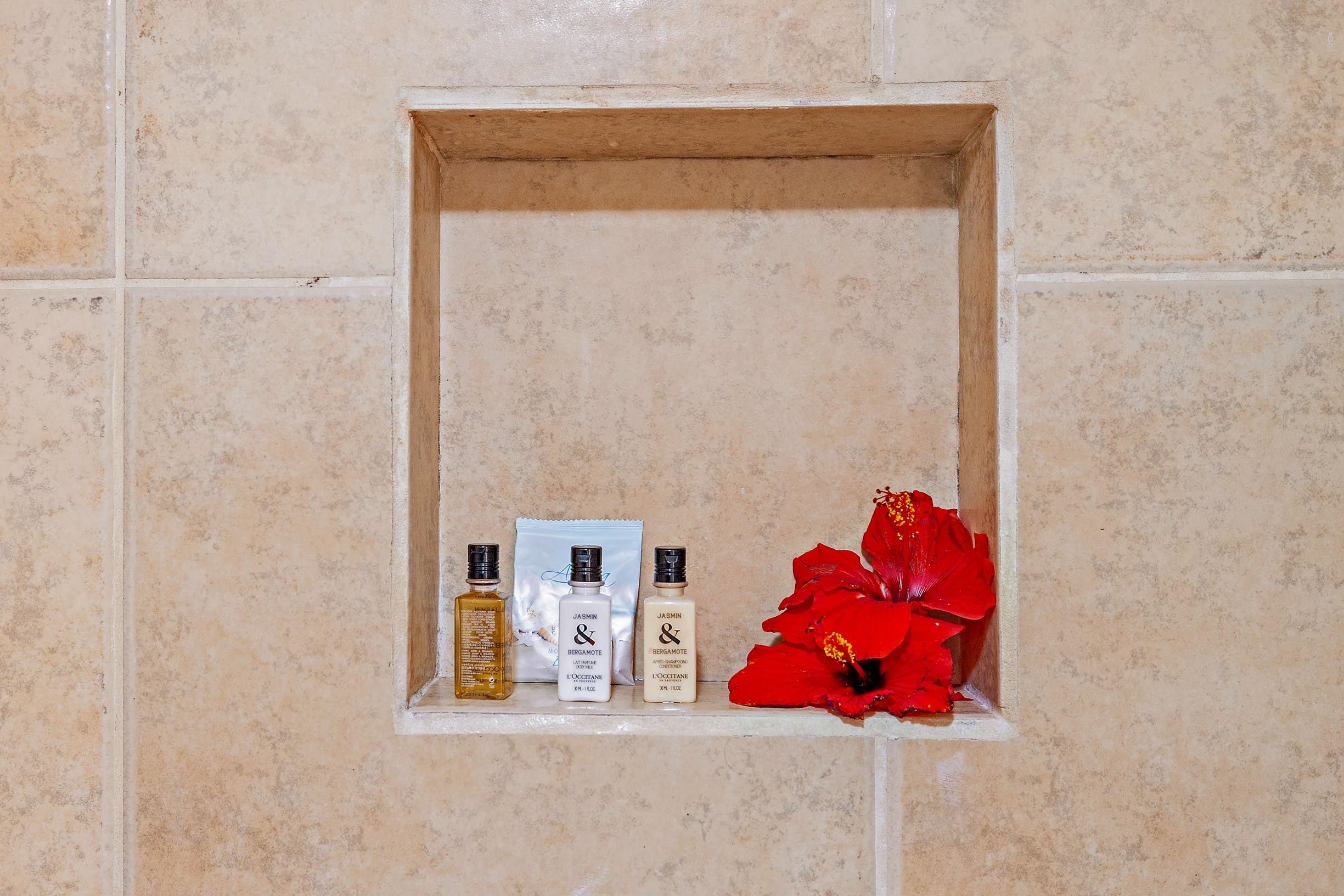 3543 Lower Honoapiilani Road, Unit H201 Lahaina, HI 96761 - Photo 17 of 31 view of a room that has a bed and a chair