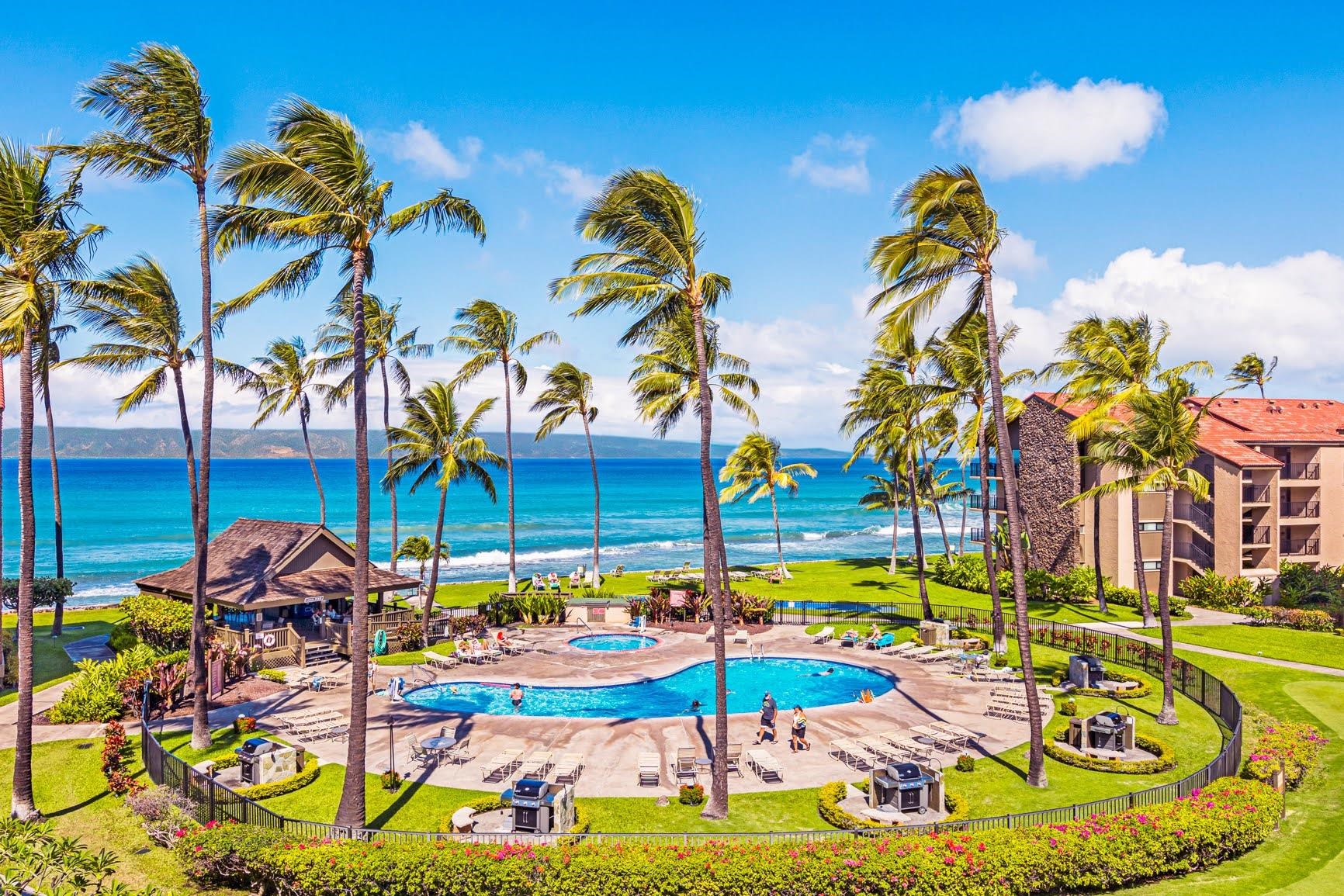 3543 Lower Honoapiilani Road, Unit H201 Lahaina, HI 96761 - Photo 2 of 31 a view of a swimming pool with outdoor seating
