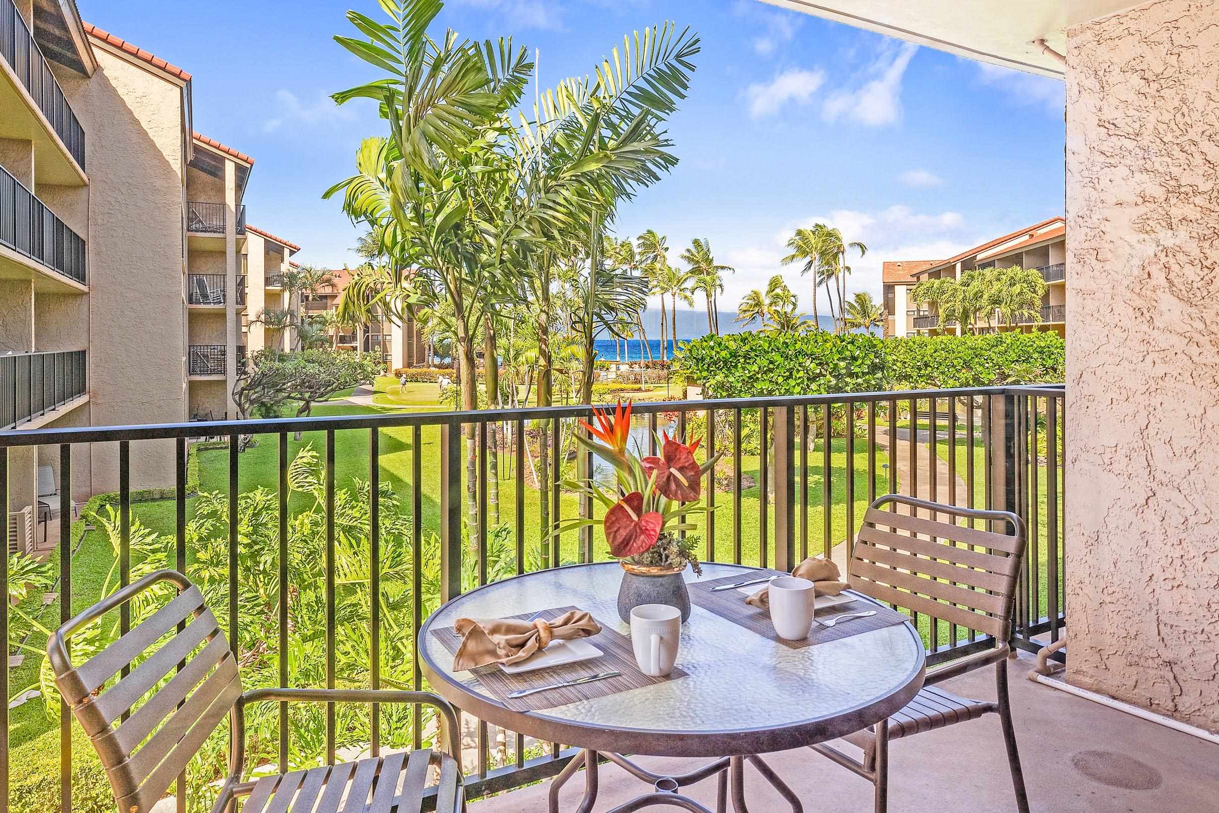 3543 Lower Honoapiilani Road, Unit H201 Lahaina, HI 96761 - Photo 26 of 31 a view of a chairs and table in patio