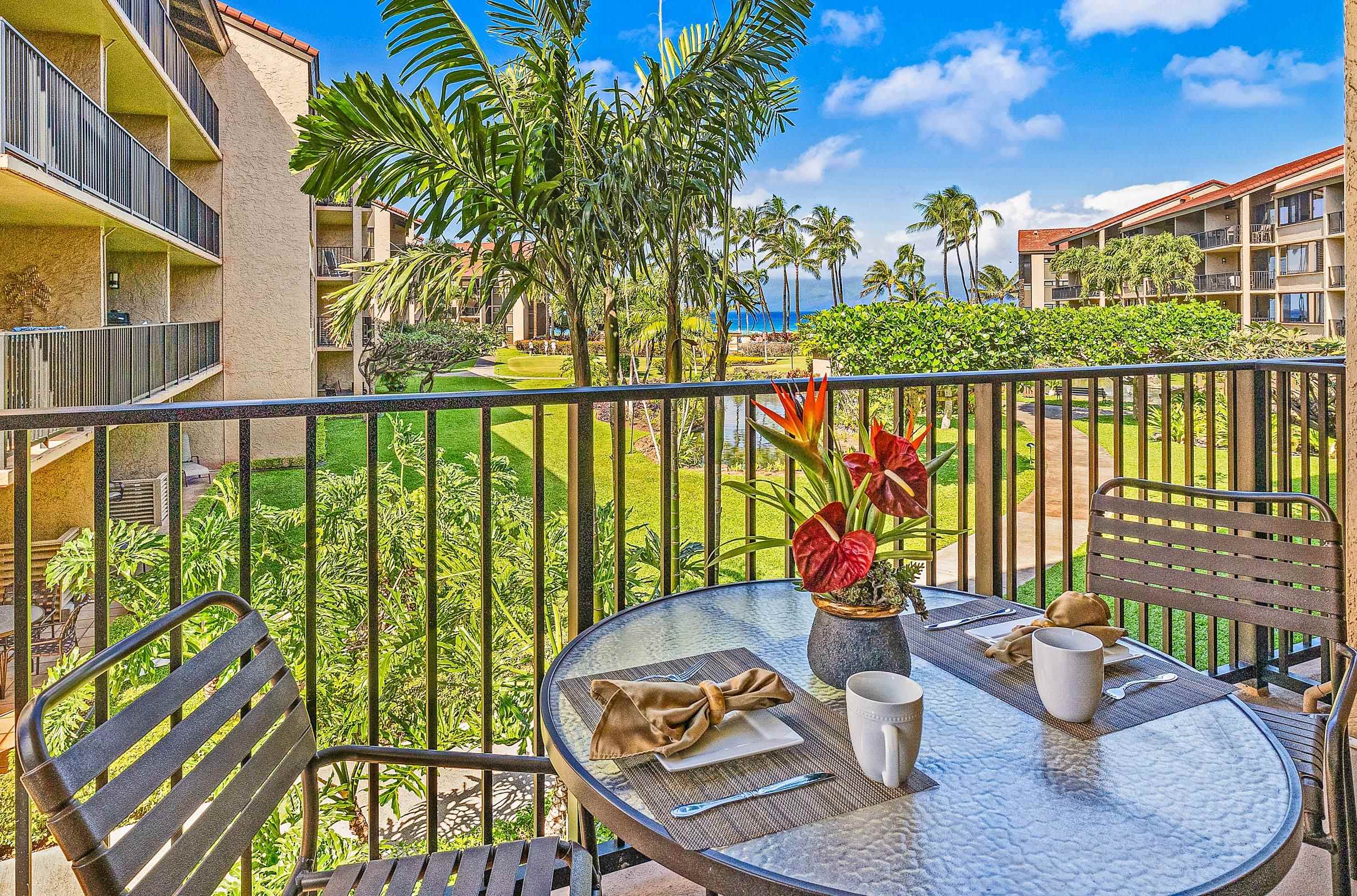 3543 Lower Honoapiilani Road, Unit H201 Lahaina, HI 96761 - Photo 3 of 31 a view of a chairs and table in patio
