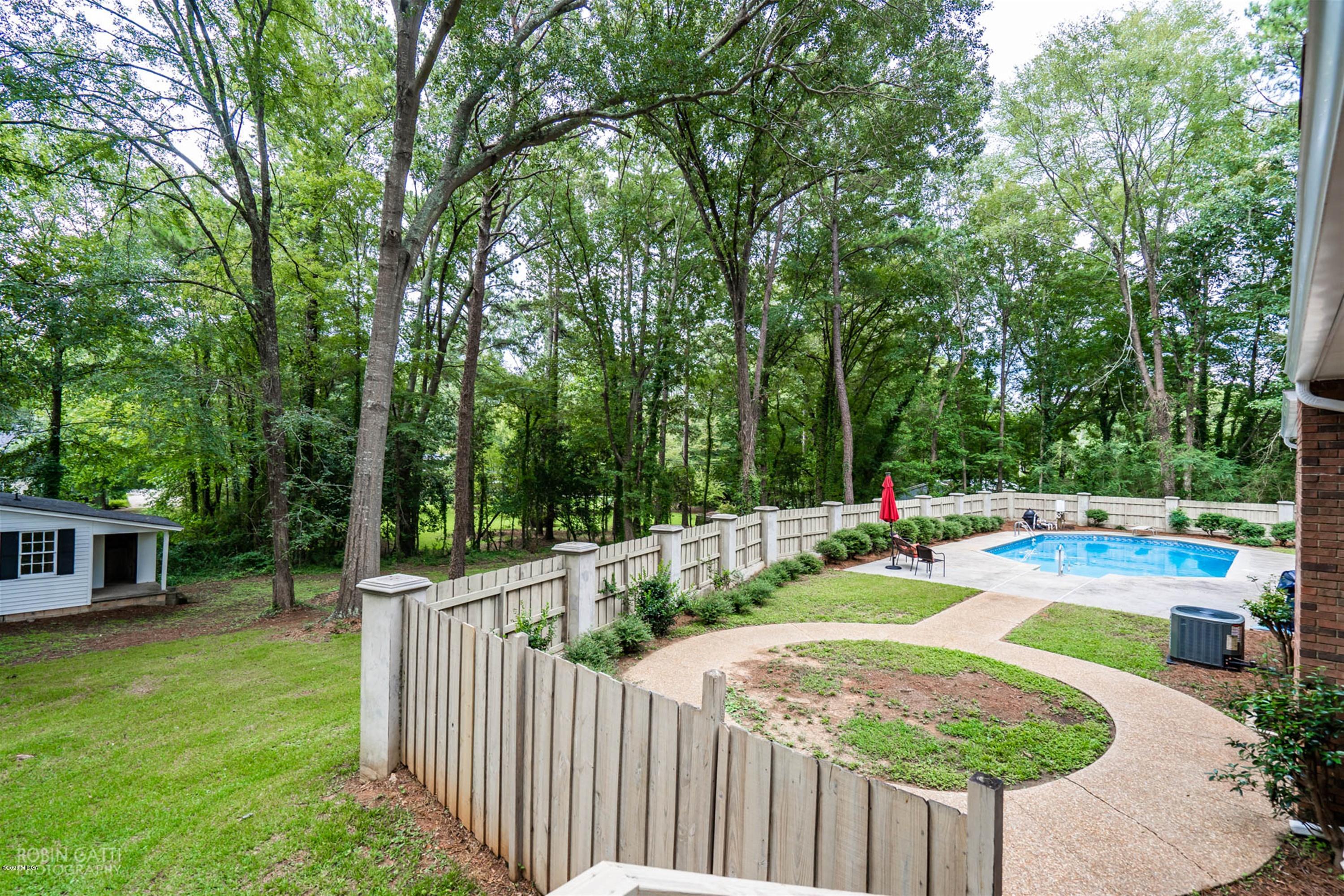 5435 Riverside Drive Macon, GA 31210 - Photo 3 of 34 a view of a backyard with swimming pool