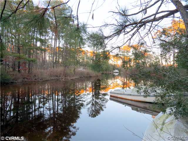 85 Hicks Road Hudgins, VA 23076 - Photo 1 of 4 a view of lake