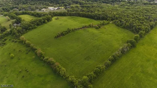 a view of a water with a yard