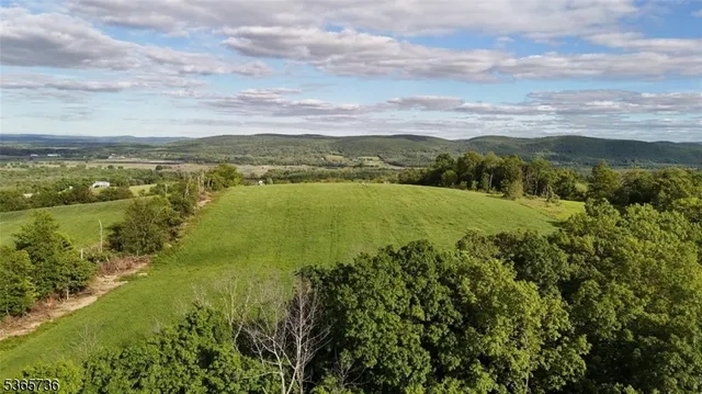 a view of an ocean and a mountain