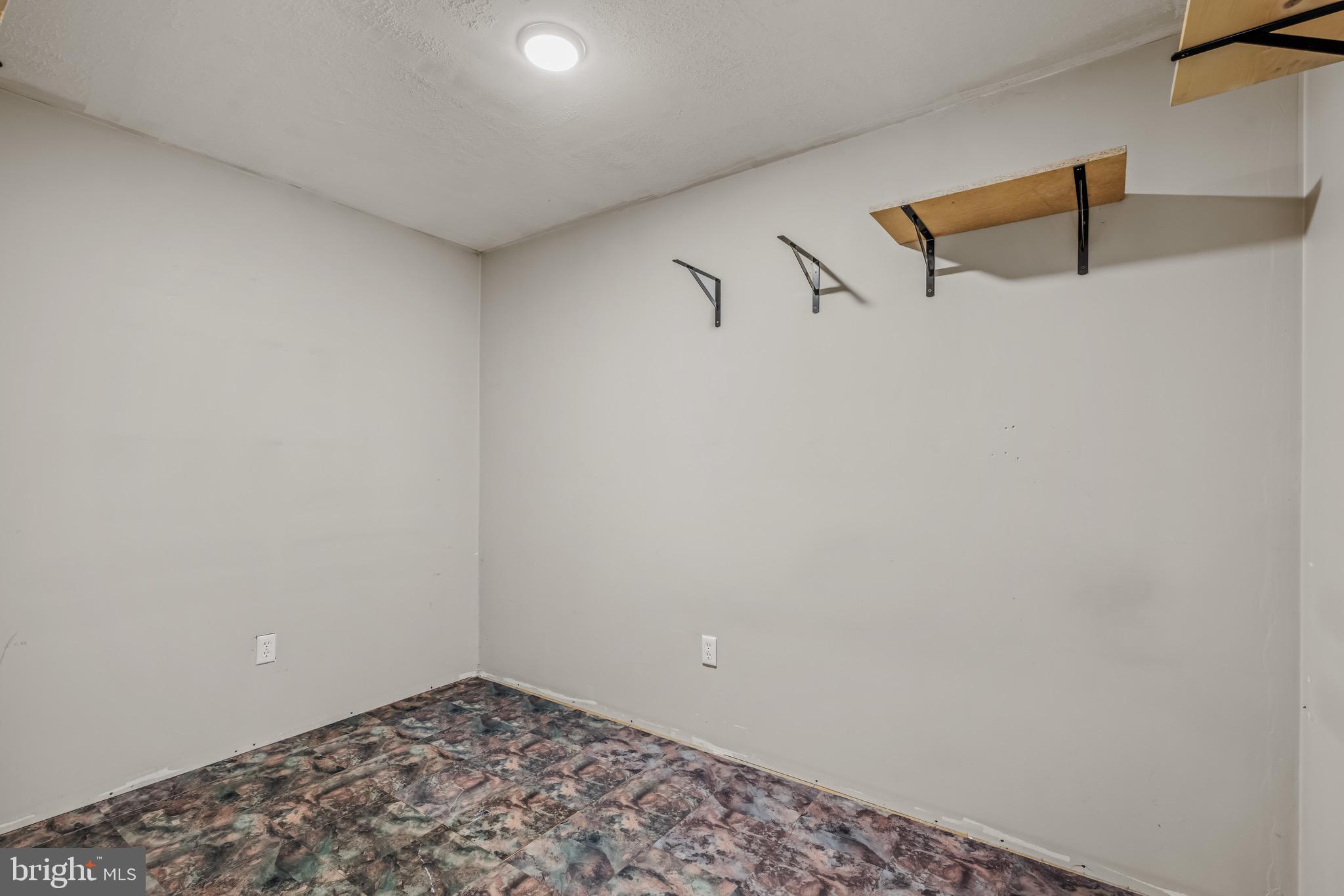 393 Ridersville Road Berkeley Springs, WV 25411 - Photo 11 of 32 a view of a room with window