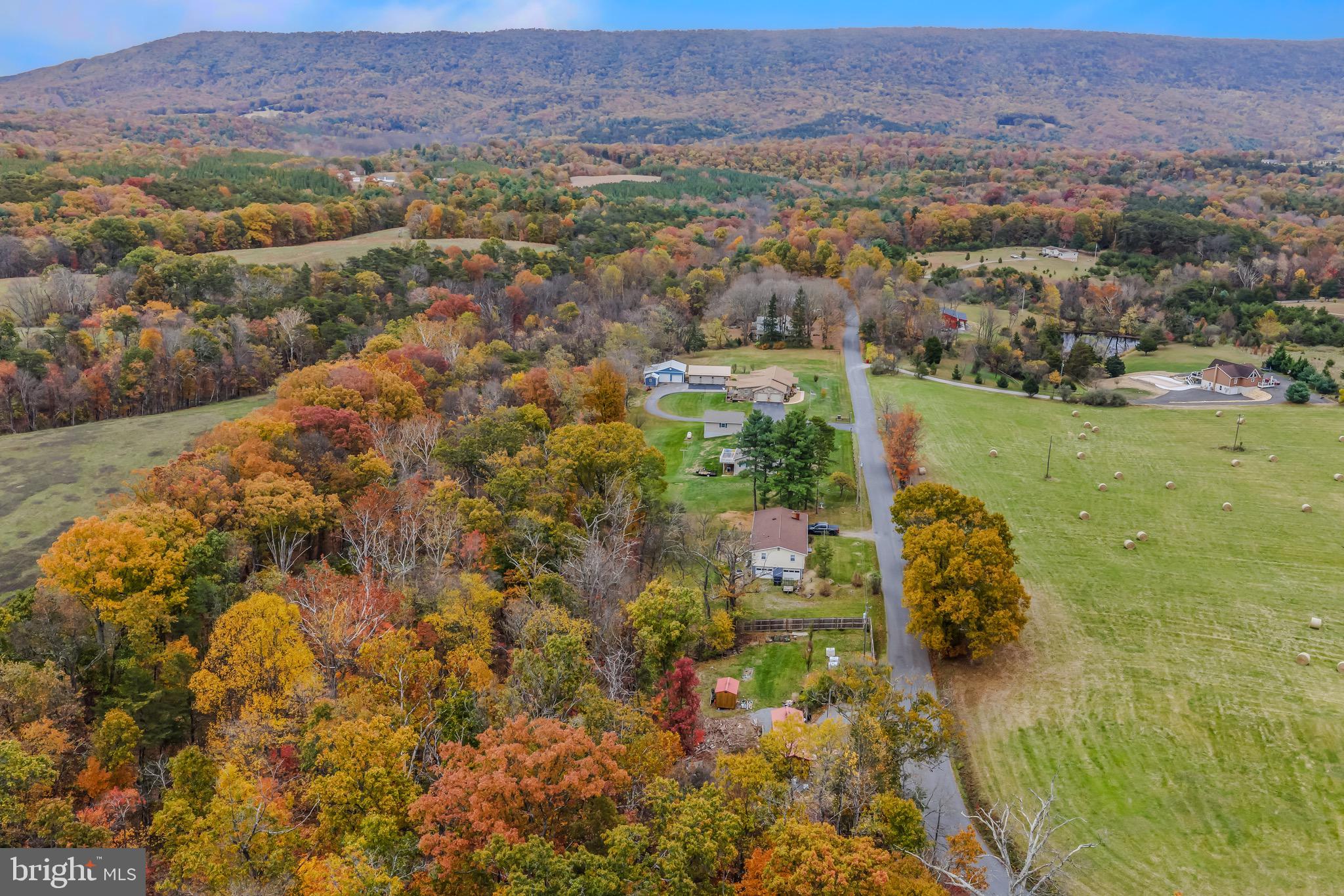 393 Ridersville Road Berkeley Springs, WV 25411 - Photo 28 of 32 an aerial view of residential houses with outdoor space