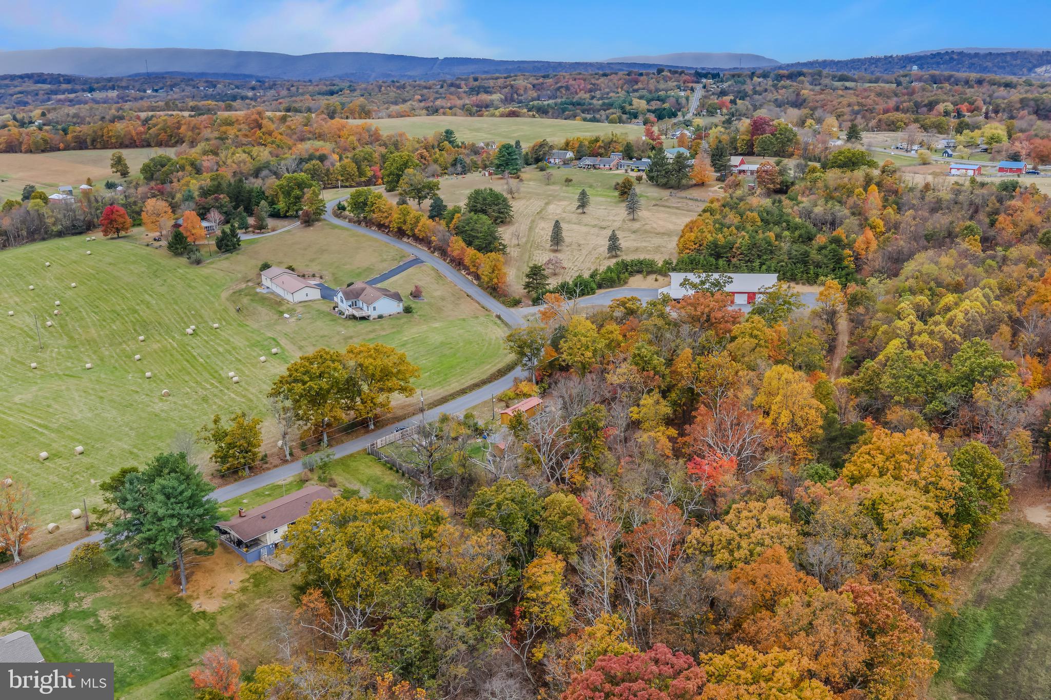 393 Ridersville Road Berkeley Springs, WV 25411 - Photo 32 of 32 an aerial view of residential houses with outdoor space