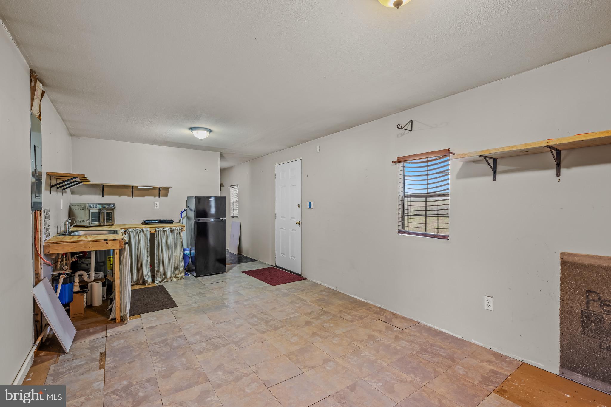 393 Ridersville Road Berkeley Springs, WV 25411 - Photo 8 of 32 a view of a storage & utility room
