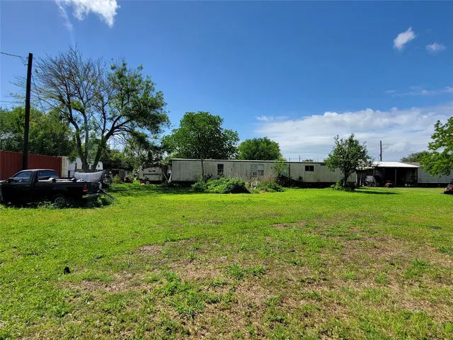 a view of garden with patio