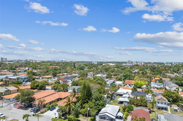 a view of a backyard of the house