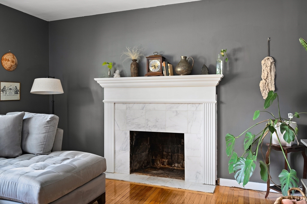 53 Mueller Road Holyoke, MA 01040 - Photo 15 of 40 a bedroom with a bed and a fireplace