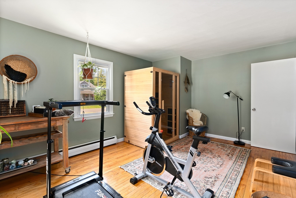 53 Mueller Road Holyoke, MA 01040 - Photo 26 of 40 a room with gym equipment and a large window
