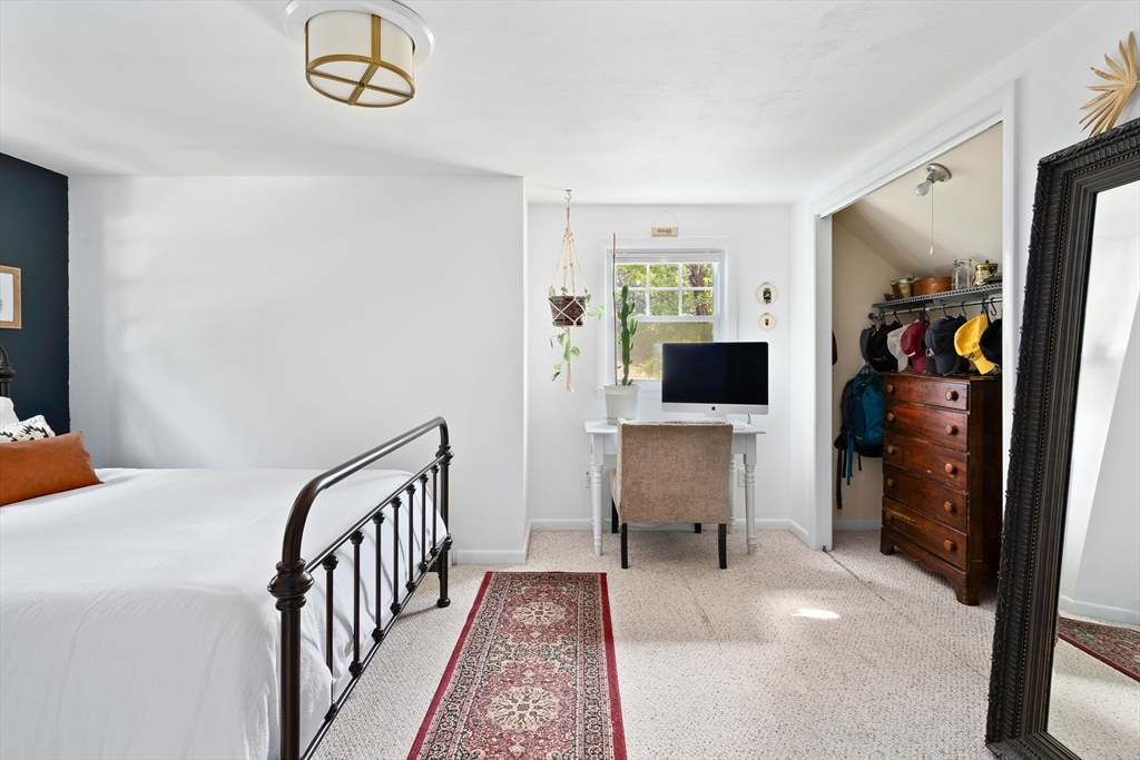 53 Mueller Road Holyoke, MA 01040 - Photo 30 of 40 a bedroom with furniture and a window