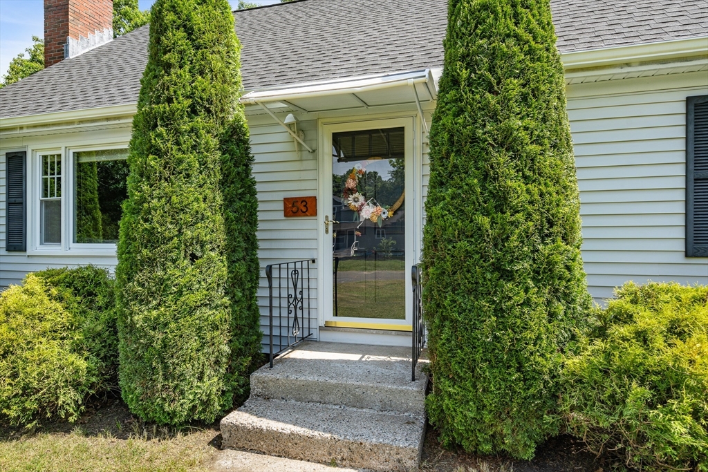53 Mueller Road Holyoke, MA 01040 - Photo 3 of 40 a front view of a house with a yard