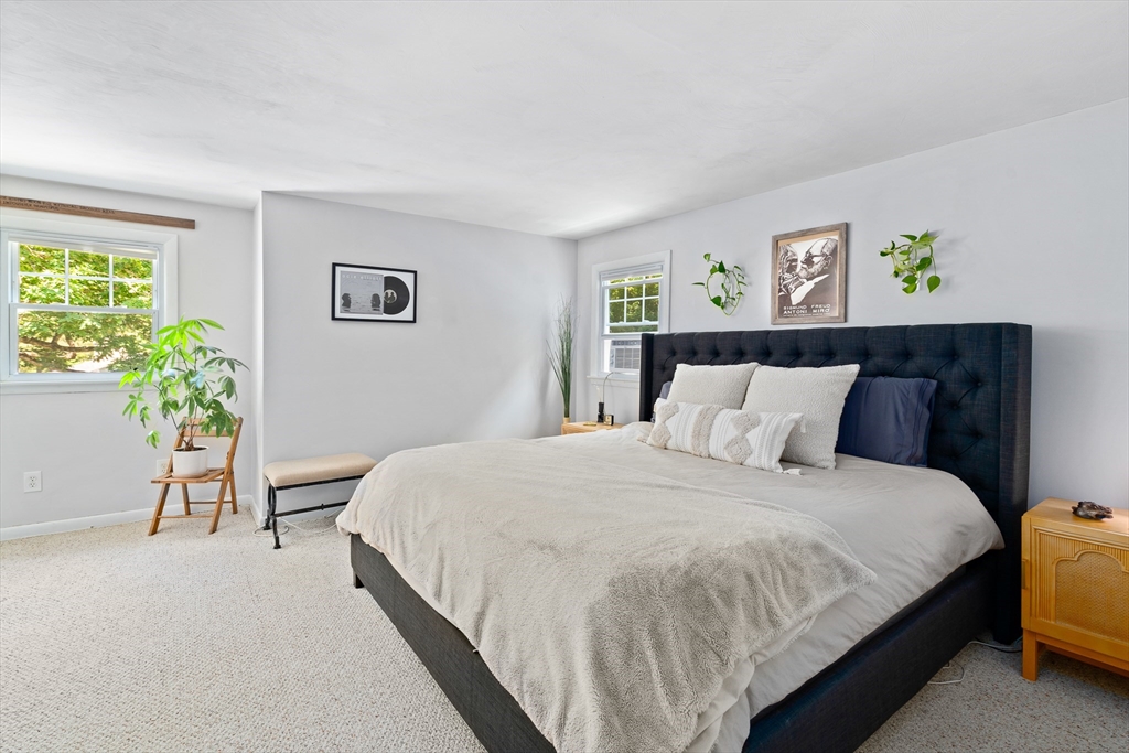 53 Mueller Road Holyoke, MA 01040 - Photo 34 of 40 a bedroom with a bed and a painting on the wall