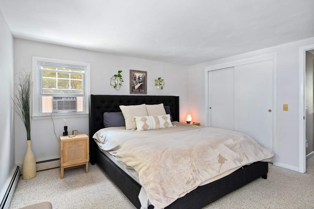 53 Mueller Road Holyoke, MA 01040 - Photo 35 of 40 a bedroom with a bed and a window