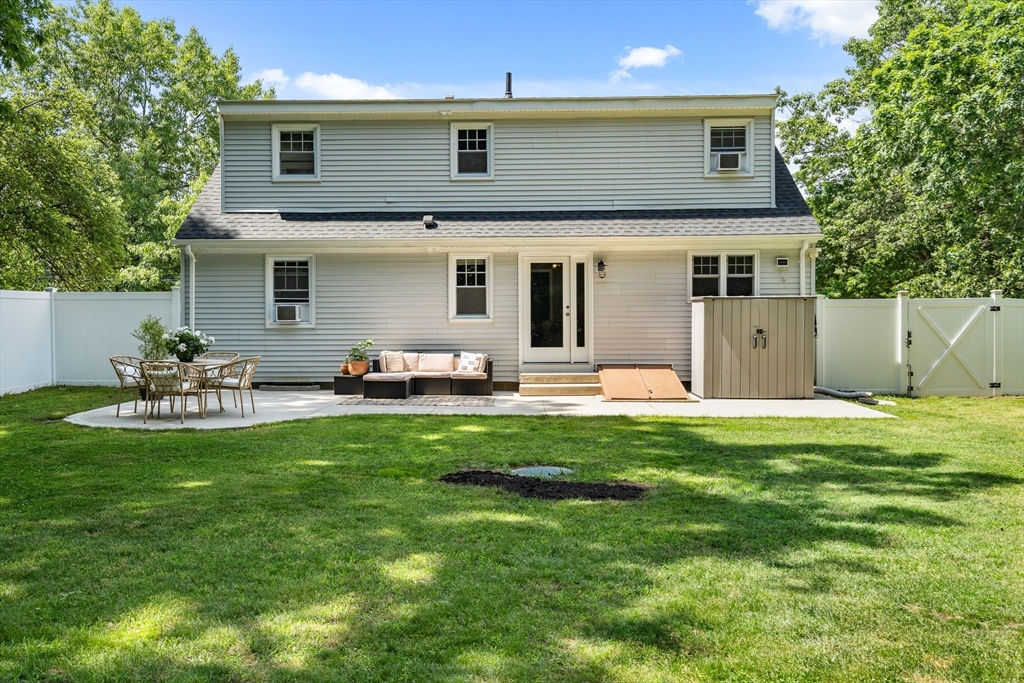 53 Mueller Road Holyoke, MA 01040 - Photo 5 of 40 a front view of house with a garden and patio