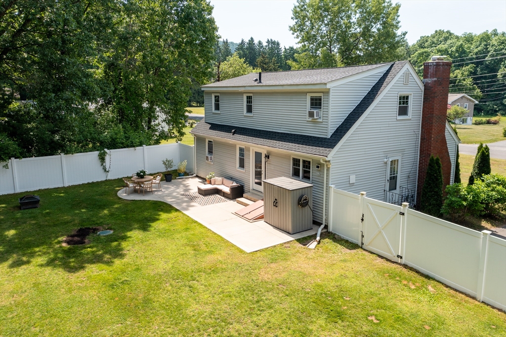 53 Mueller Road Holyoke, MA 01040 - Photo 8 of 40 a view of a house with pool and chairs
