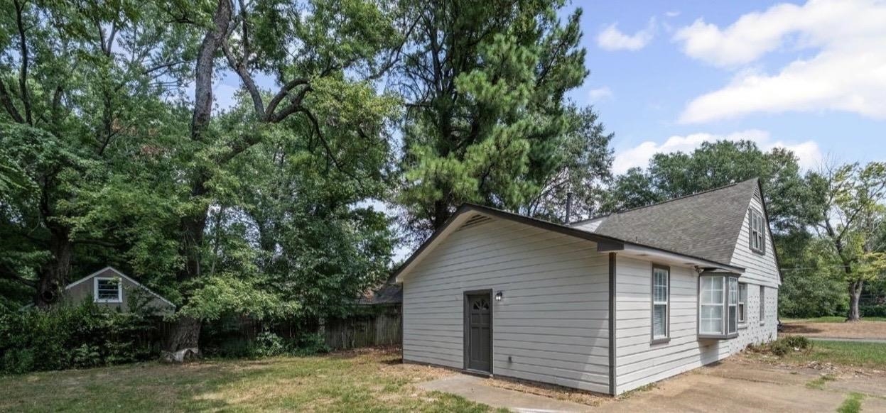3843 Blue Jay Road Memphis, TN 38116 - Photo 2 of 23 a view of a house with a yard