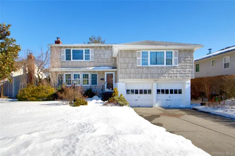 a view of a building with a yard