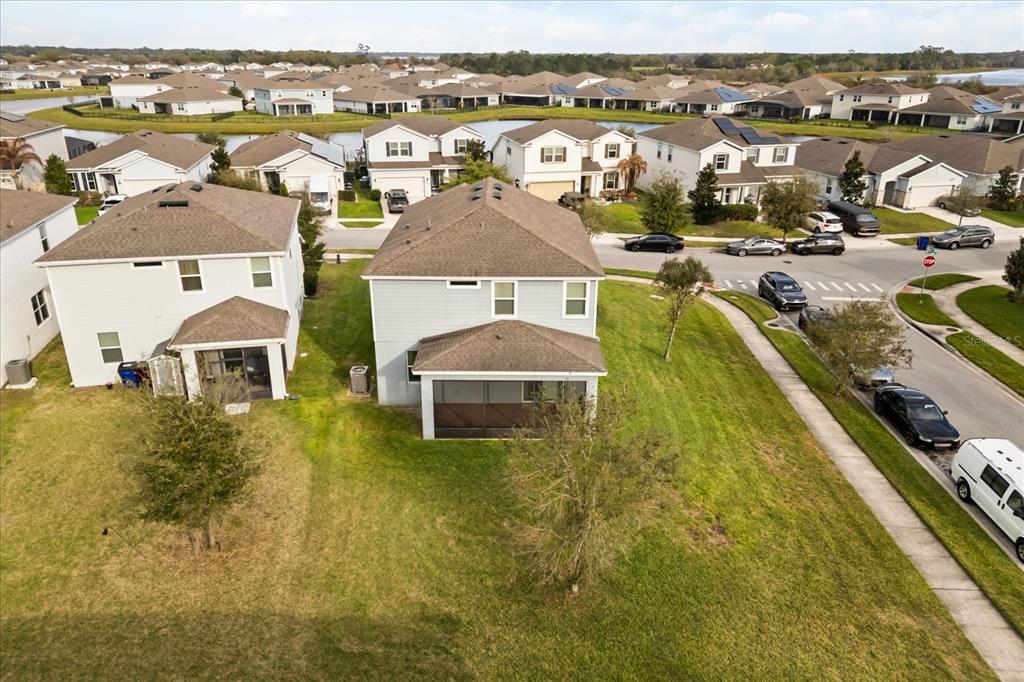 5192 Chickadee Street St. Cloud, FL 34771 - Photo 33 of 35 a view of a city with lawn chairs