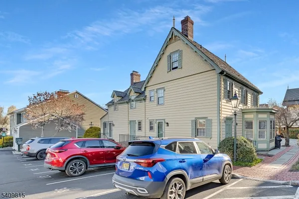 a car parked in front of a house