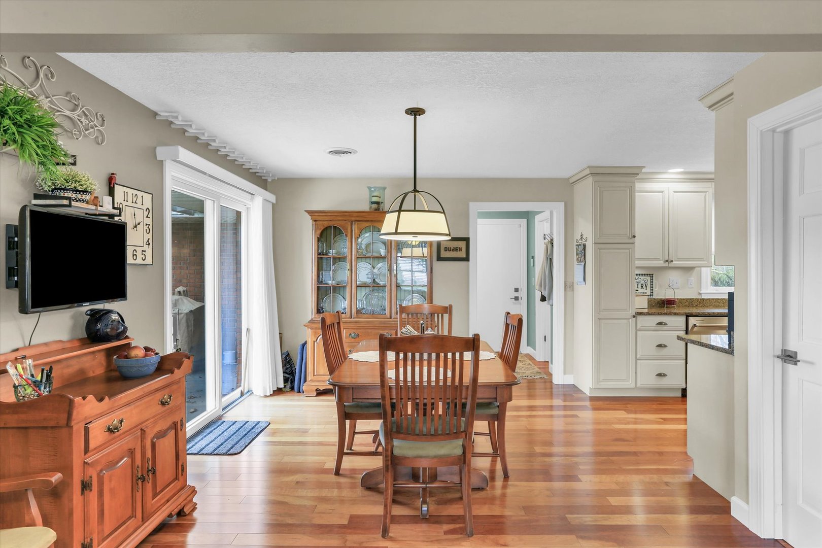 106 Cherry Drive Fithian, IL 61844 - Photo 12 of 39 a view of a dining room with furniture window and wooden floor