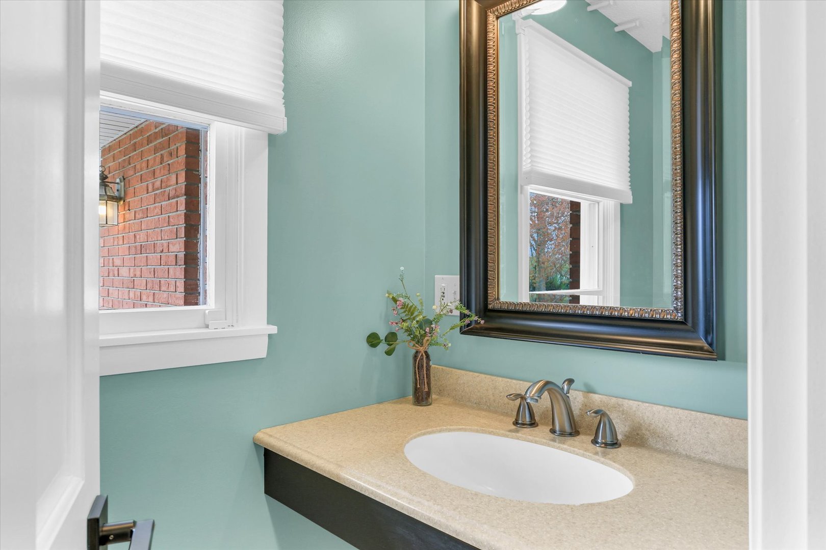 106 Cherry Drive Fithian, IL 61844 - Photo 19 of 39 a bathroom with a sink and a mirror