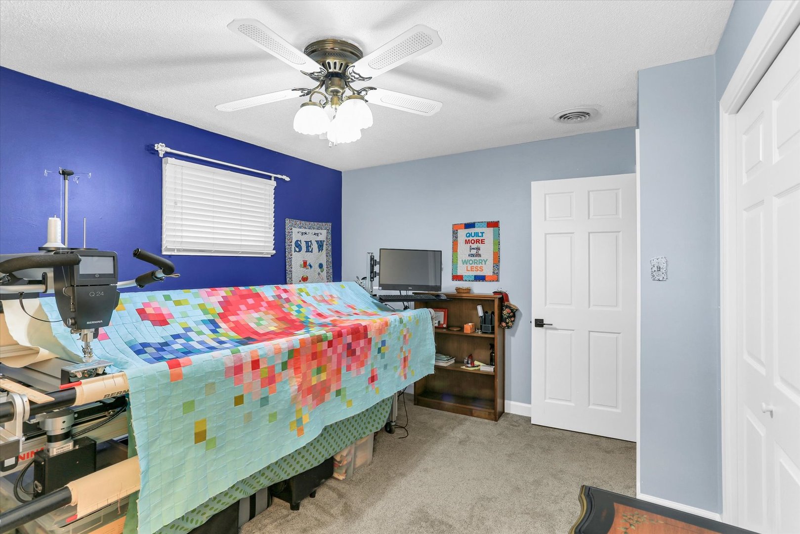 106 Cherry Drive Fithian, IL 61844 - Photo 23 of 39 a bedroom with a bed and a chandelier