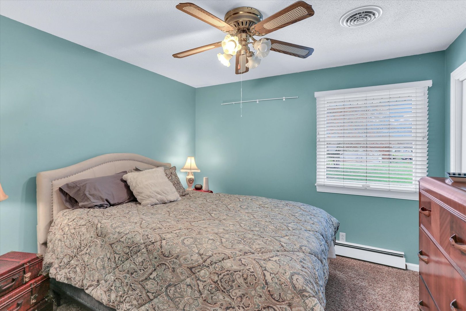 106 Cherry Drive Fithian, IL 61844 - Photo 31 of 39 a bedroom with a bed and a chandelier