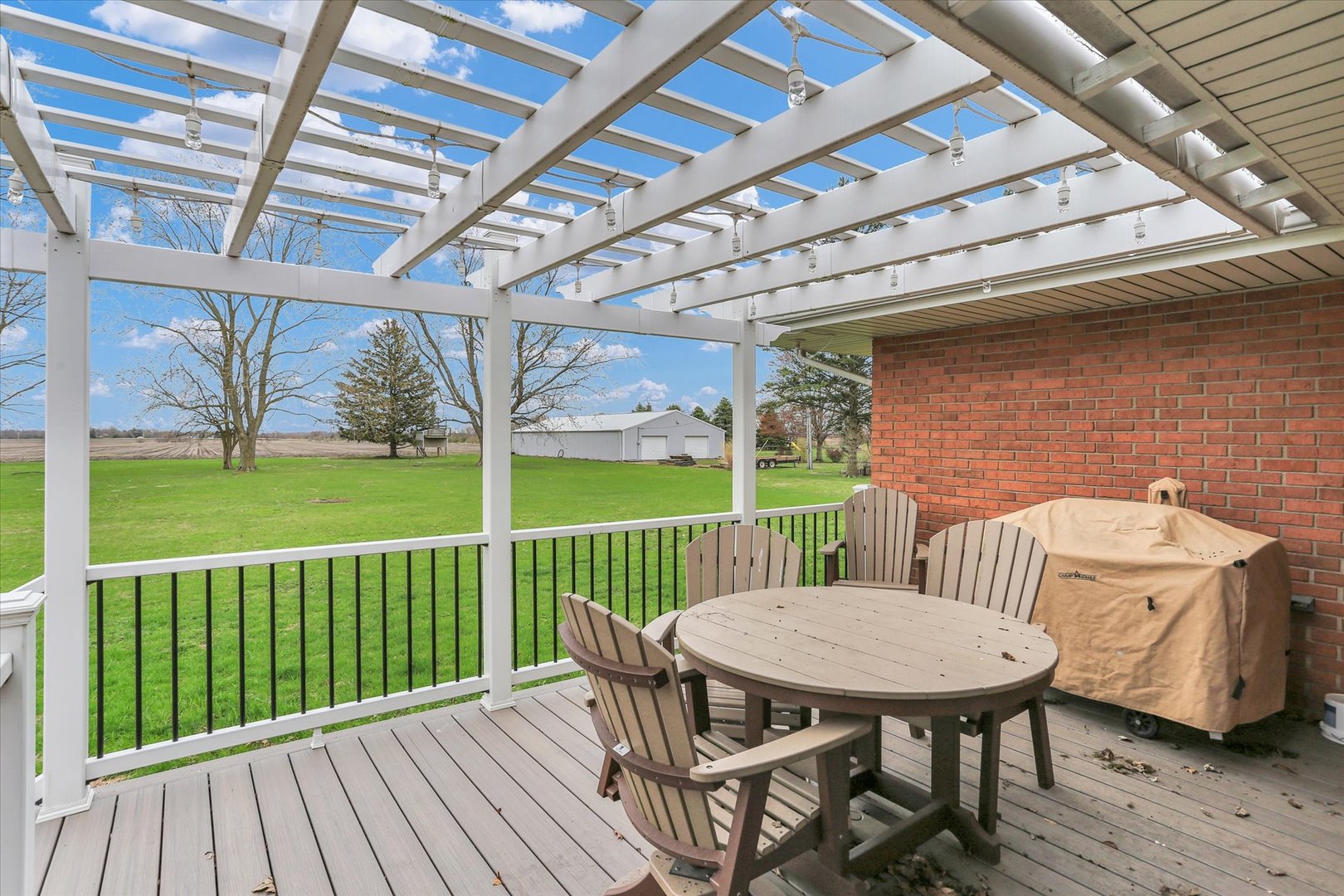 106 Cherry Drive Fithian, IL 61844 - Photo 33 of 39 a view of a chair and table on the deck