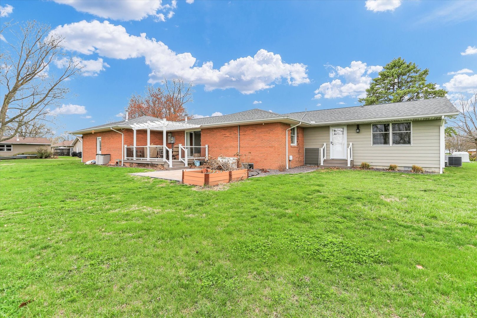 106 Cherry Drive Fithian, IL 61844 - Photo 35 of 39 a view of a house with a backyard