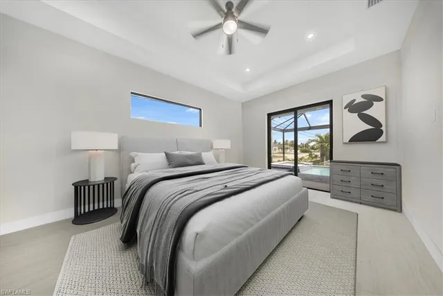 a bedroom with bed and window