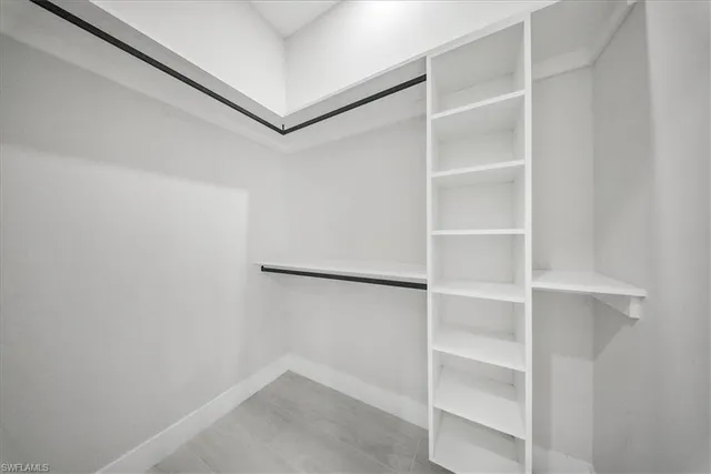 a view of an empty walk in closet