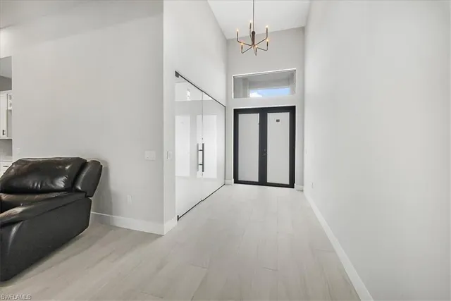 a view of a livingroom with furniture and staircase
