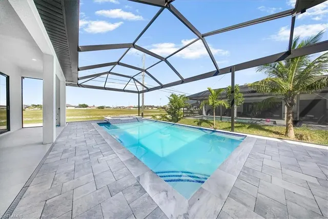 a view of swimming pool with a yard