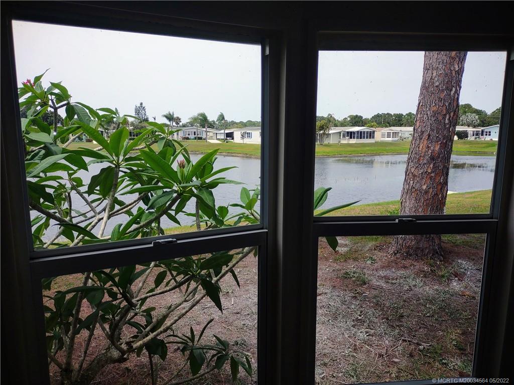 524 Thames Bluff Ridge, Unit D18 Fort Pierce, FL 34982 - Photo 11 of 24 a view of a garden from a balcony