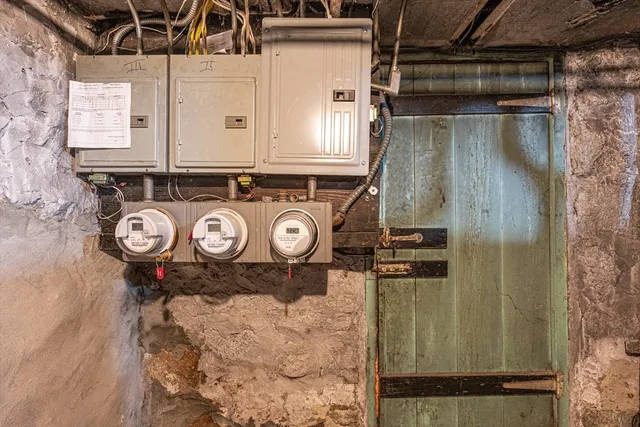 a utility room with a wooden door