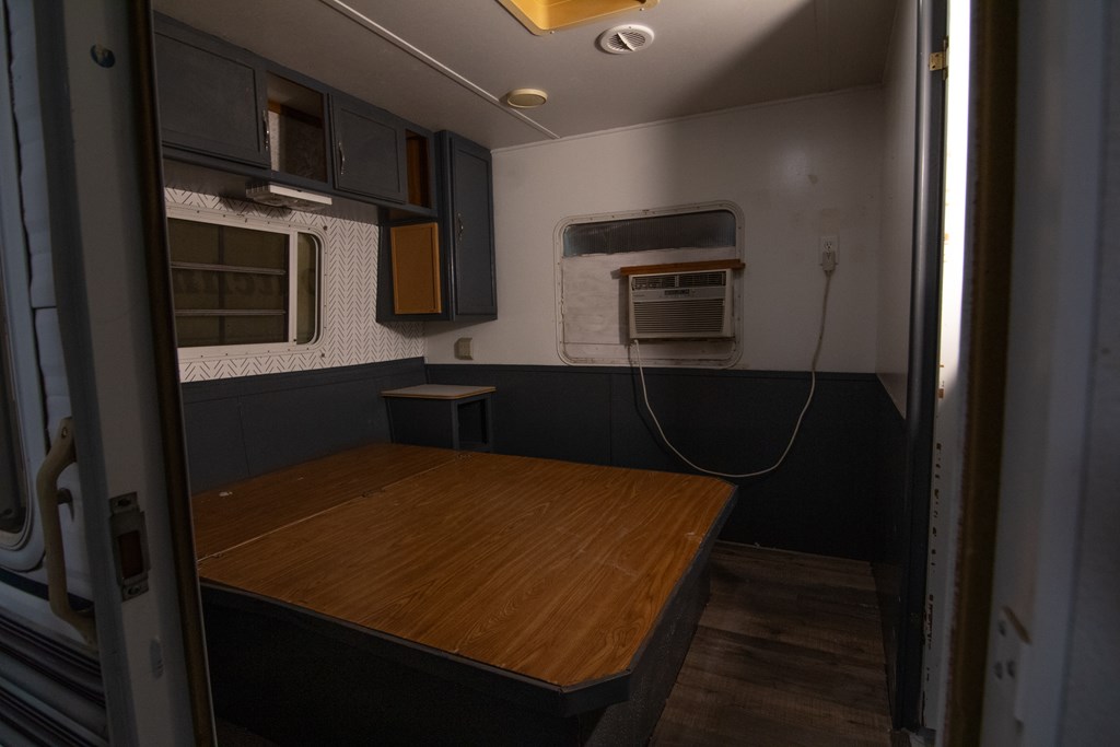 a kitchen with a sink and stainless steel appliances