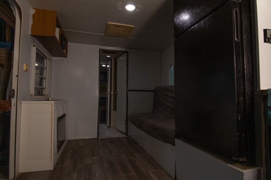 71 6th Street Ellijay, GA 30540 - Photo 6 of 9 a view of hallway with stairs and a wooden floor