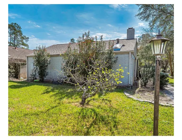 a view of a back yard of the house