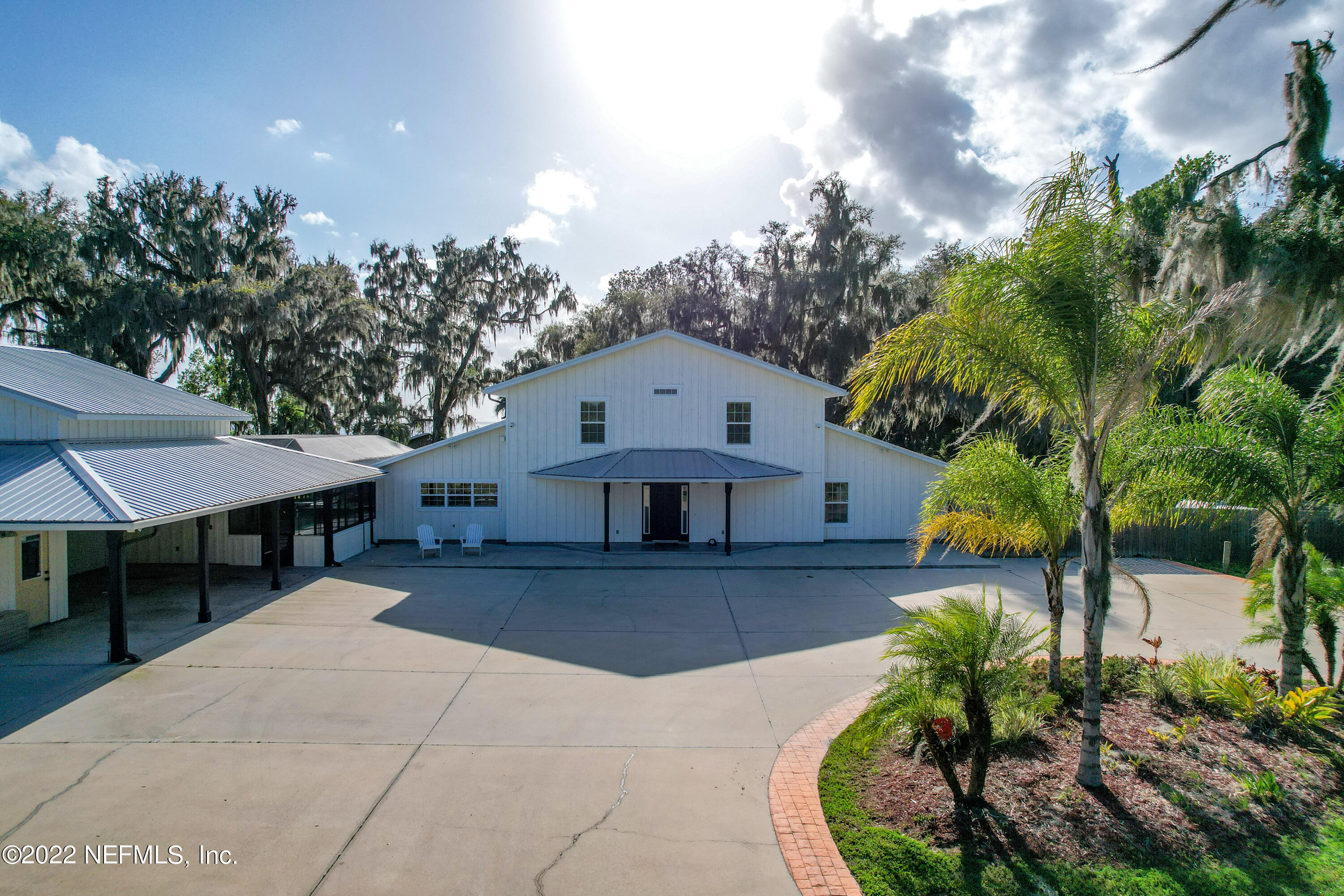 541 Federal Point Road East Palatka, FL 32131 - Photo 2 of 75 a view of a house with a patio