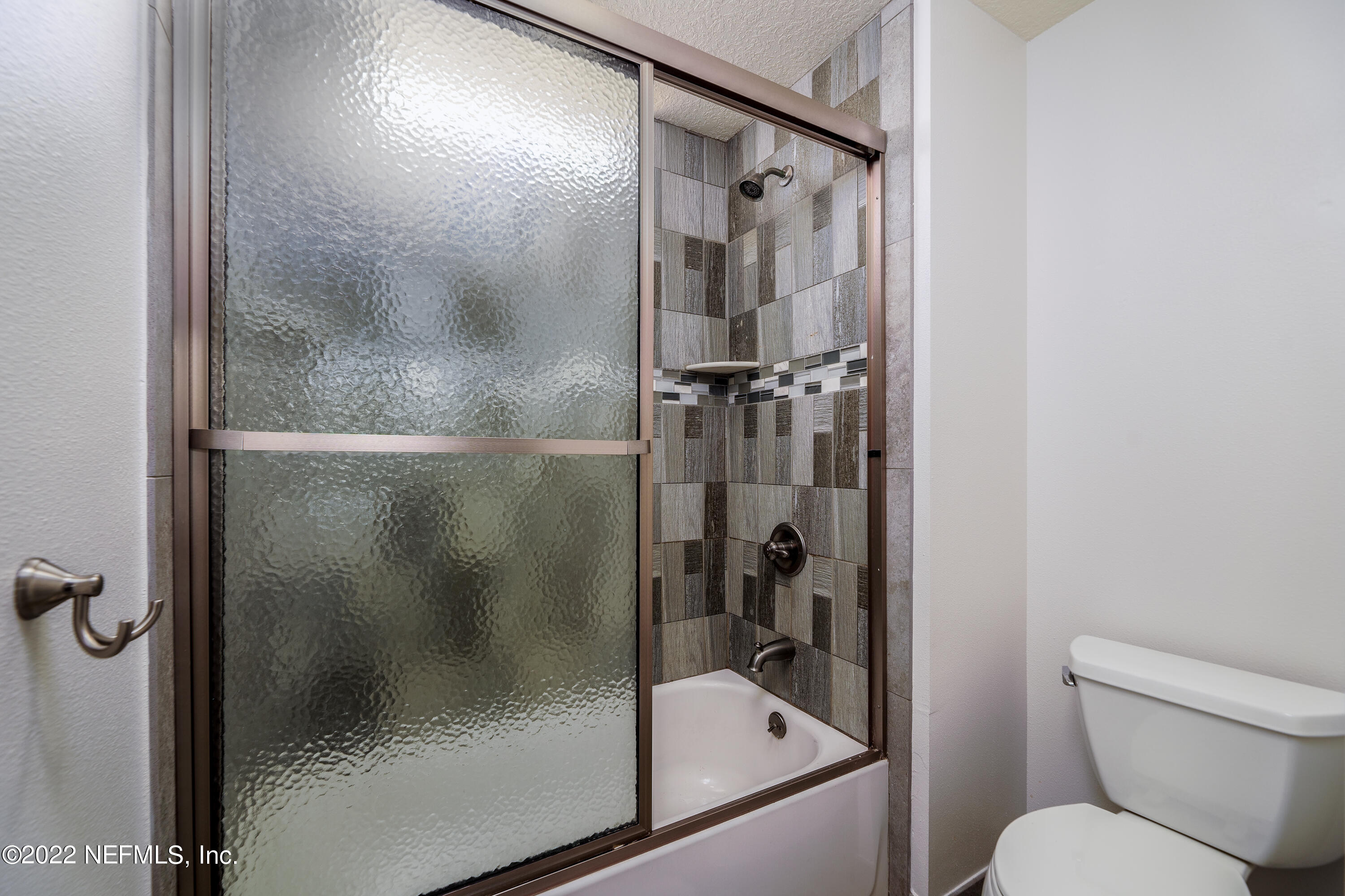 541 Federal Point Road East Palatka, FL 32131 - Photo 28 of 75 a bathroom with a shower and toilet