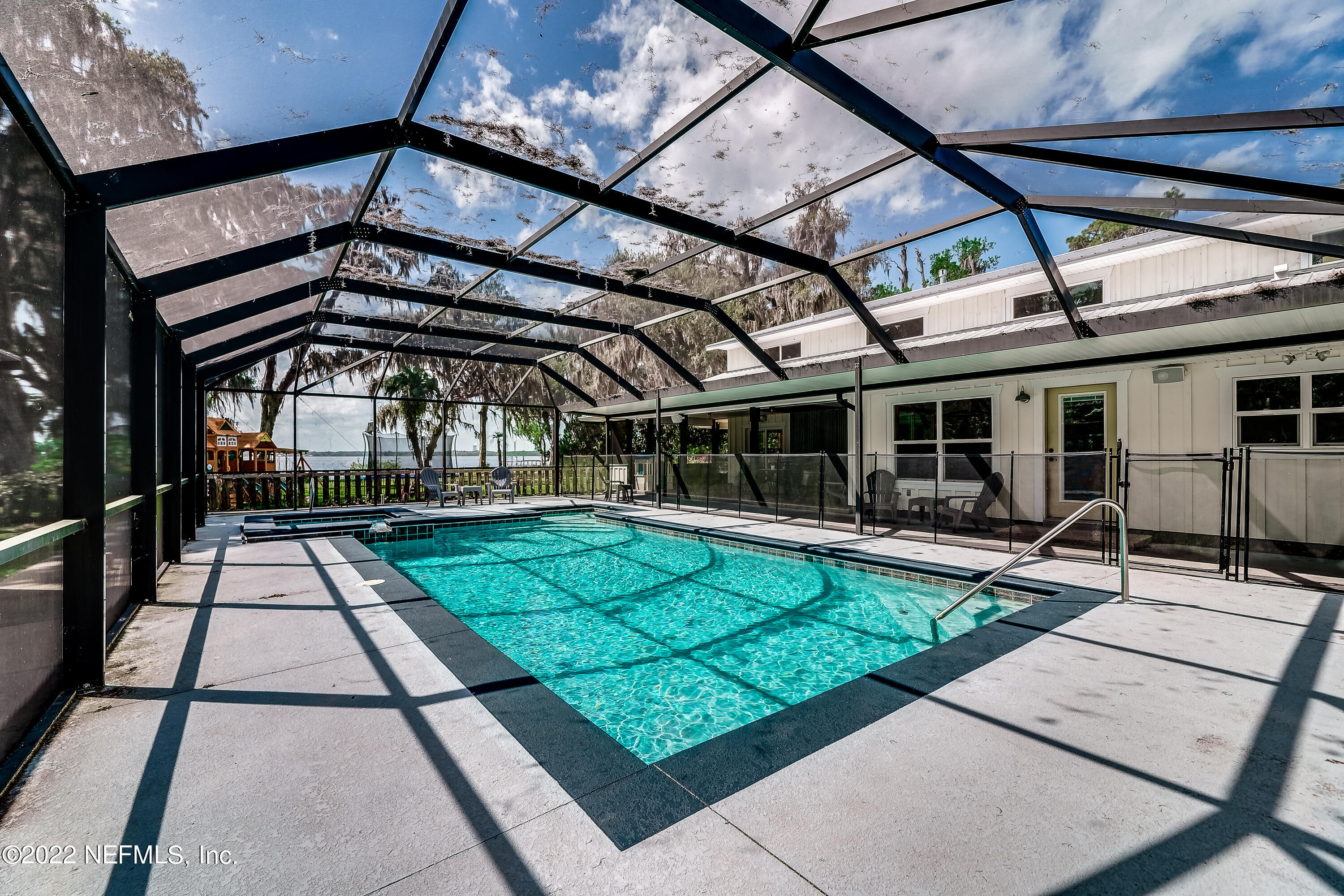 541 Federal Point Road East Palatka, FL 32131 - Photo 38 of 75 a view of a swimming pool with a patio